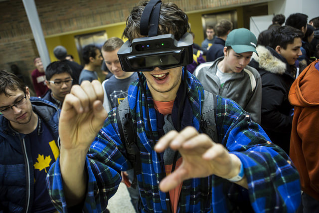 image of student wearing VR goggles