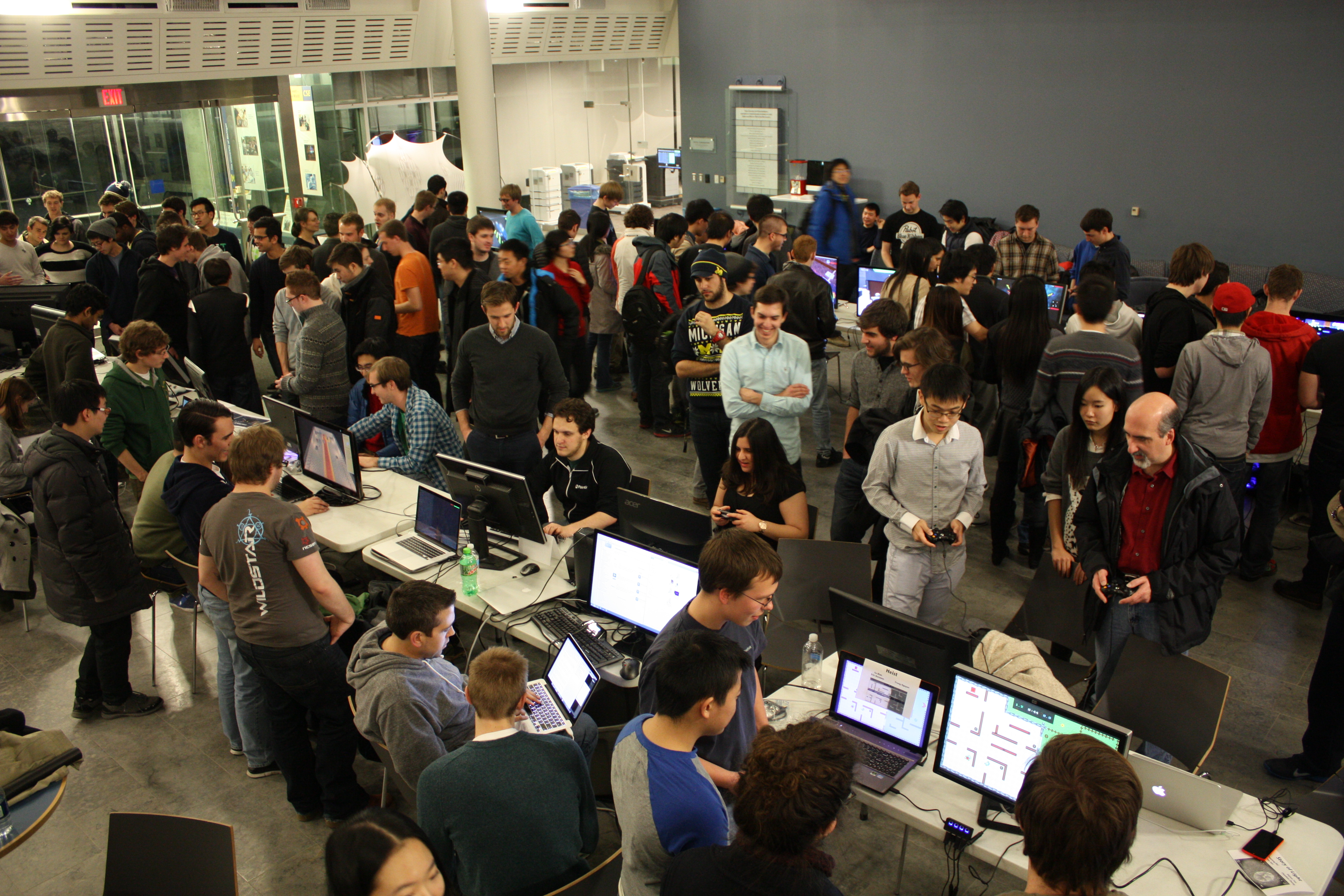 photo of large group of students using computers