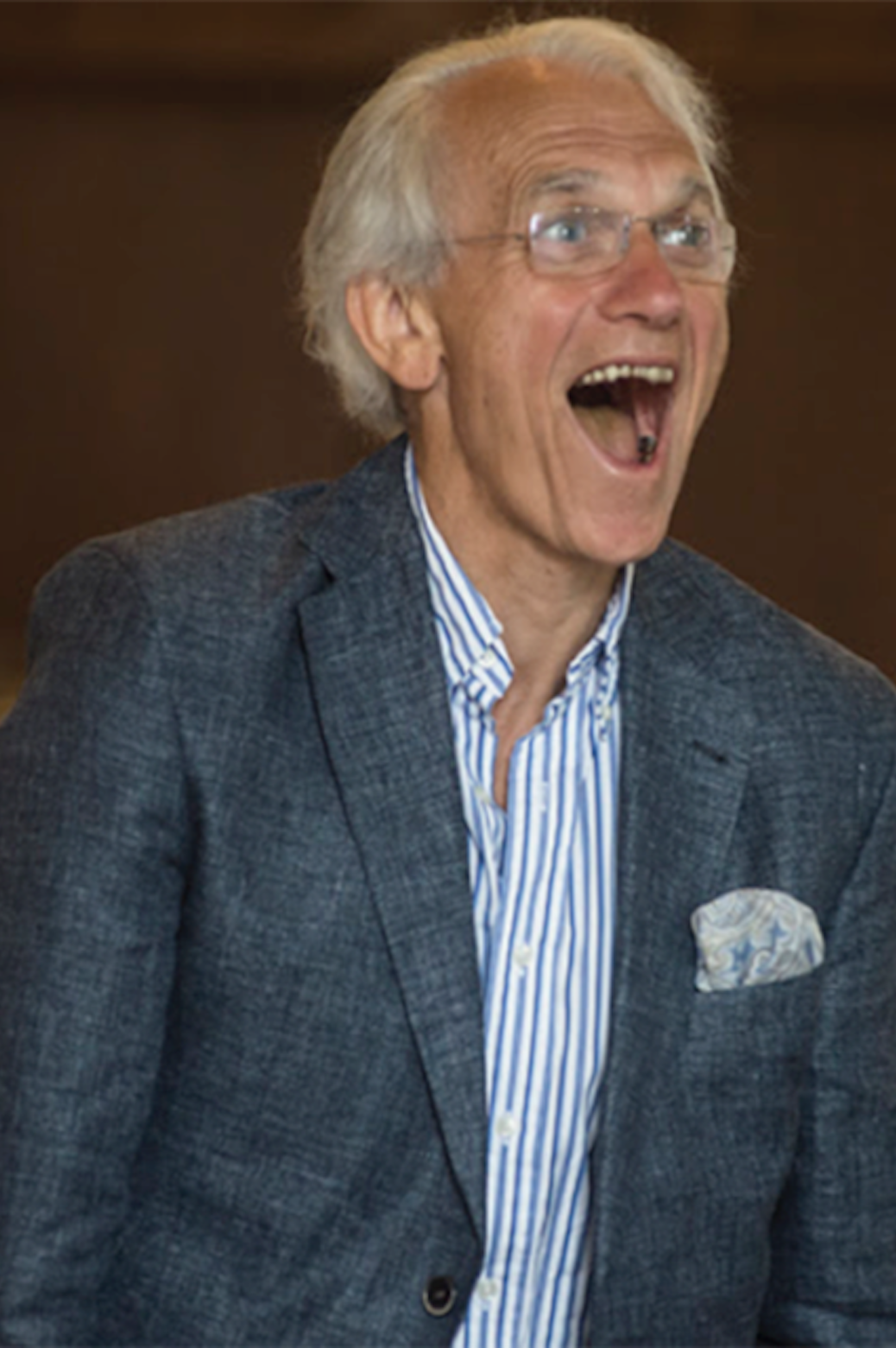 Gérard Mourou standing up with his mouth open