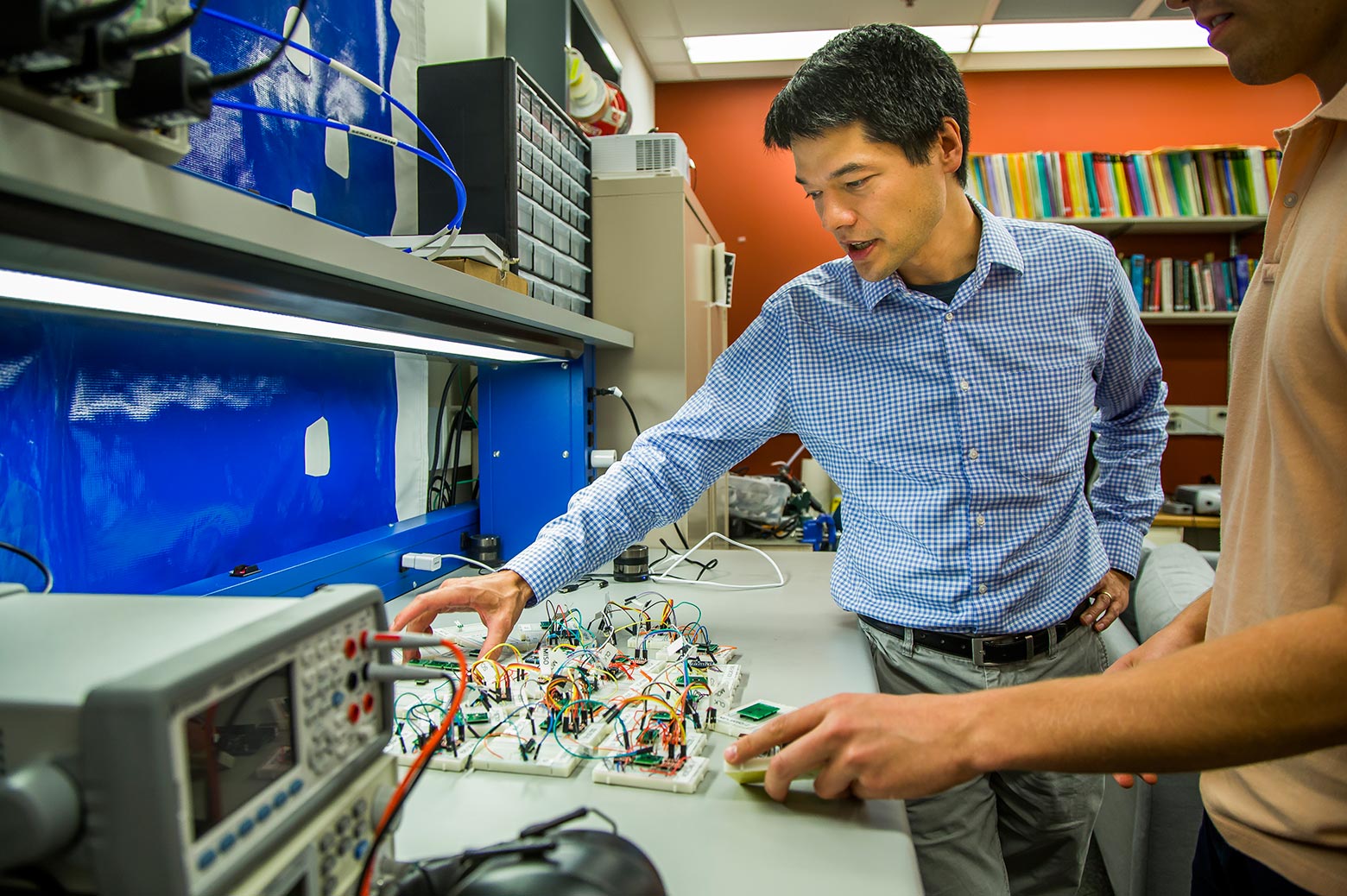 Scientist examines accelerometer sensor