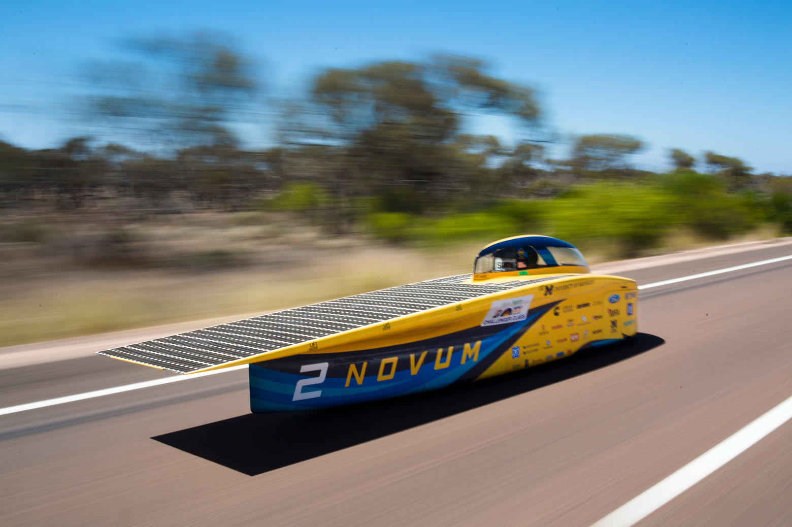 Solar car races down road in Australia