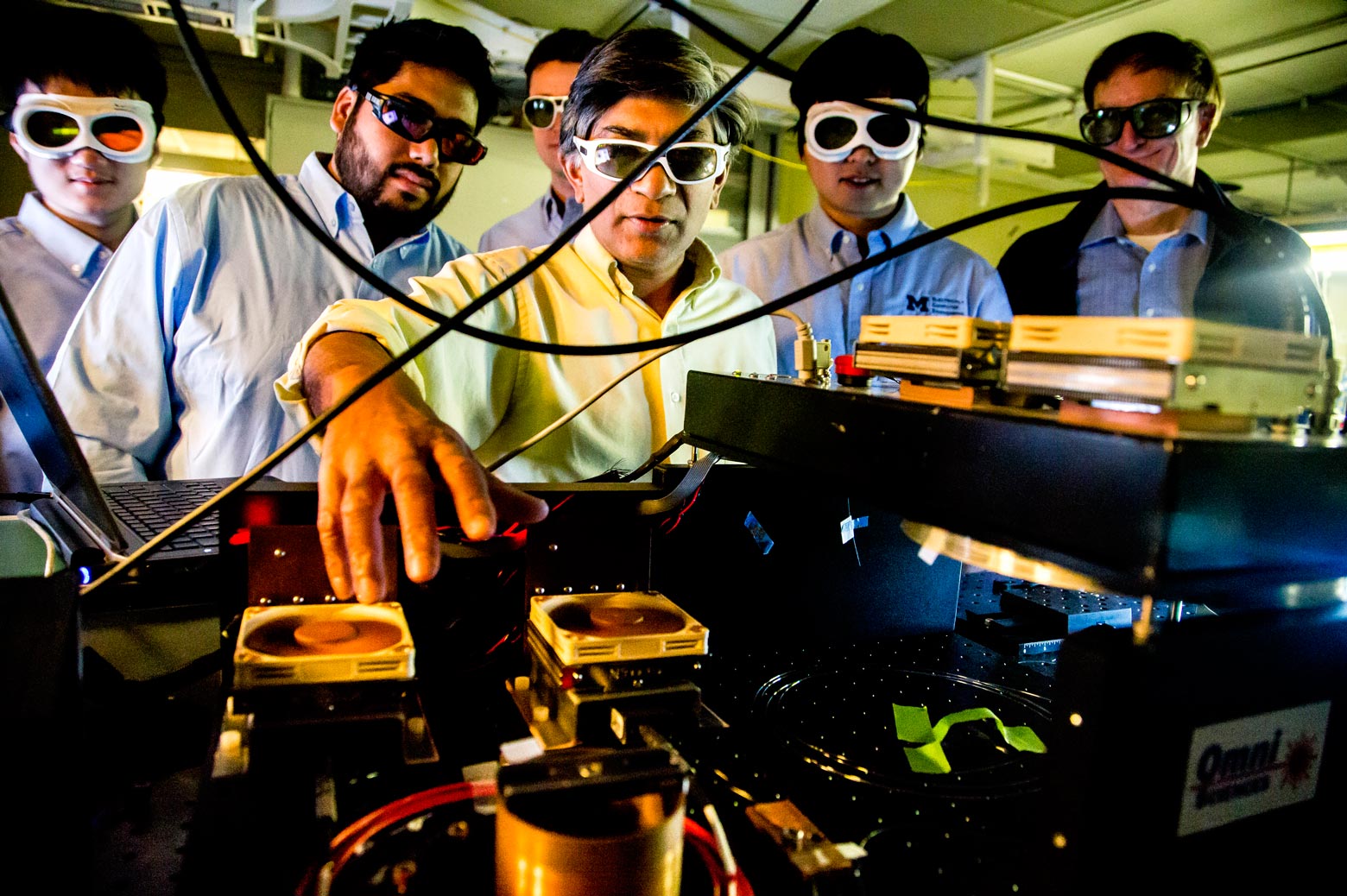 5 researchers work with computer sensors