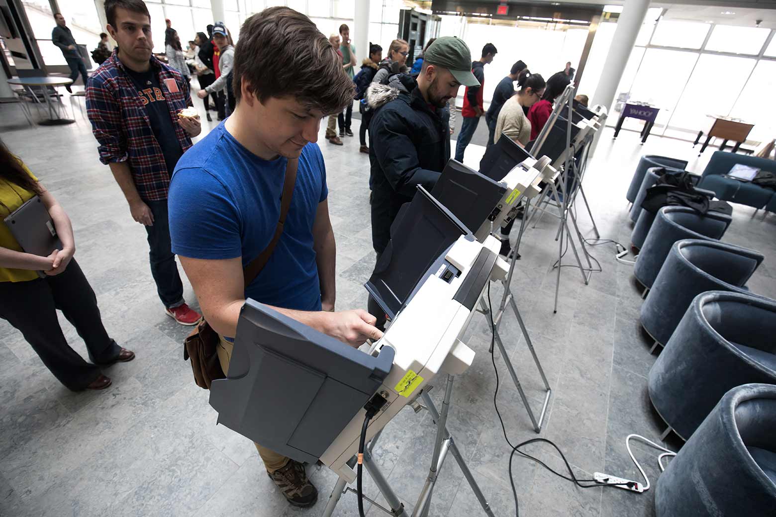 student voting at voting machine