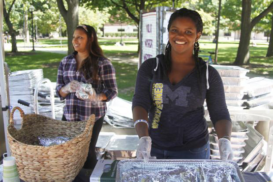 students serving food