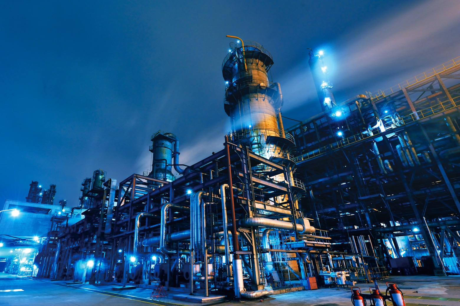 An oil refinery at night.