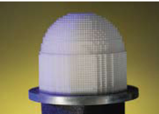 A millimeter-wave Luneberg lens fabricated monolithically using ceramic stereolithography.