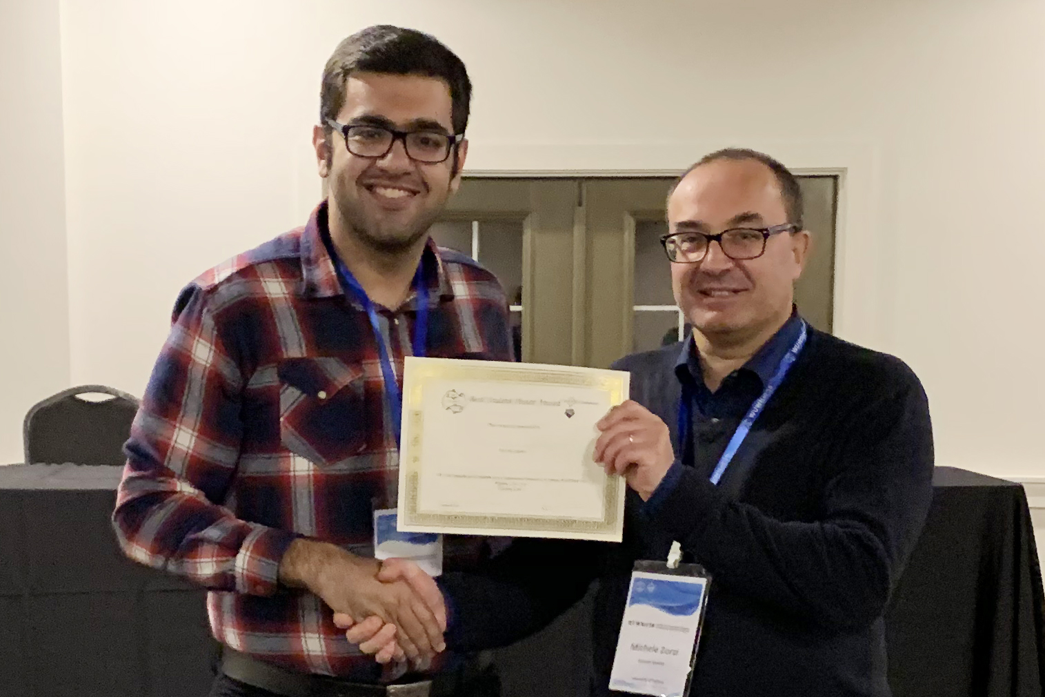 Barani accepts the Best Paper award