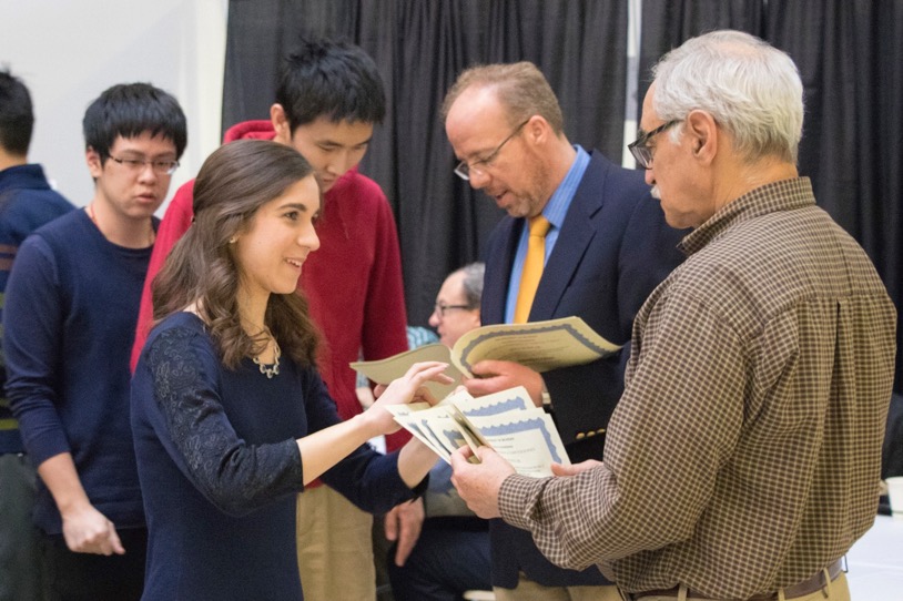 Prof. Neuhoff hands out awards to students