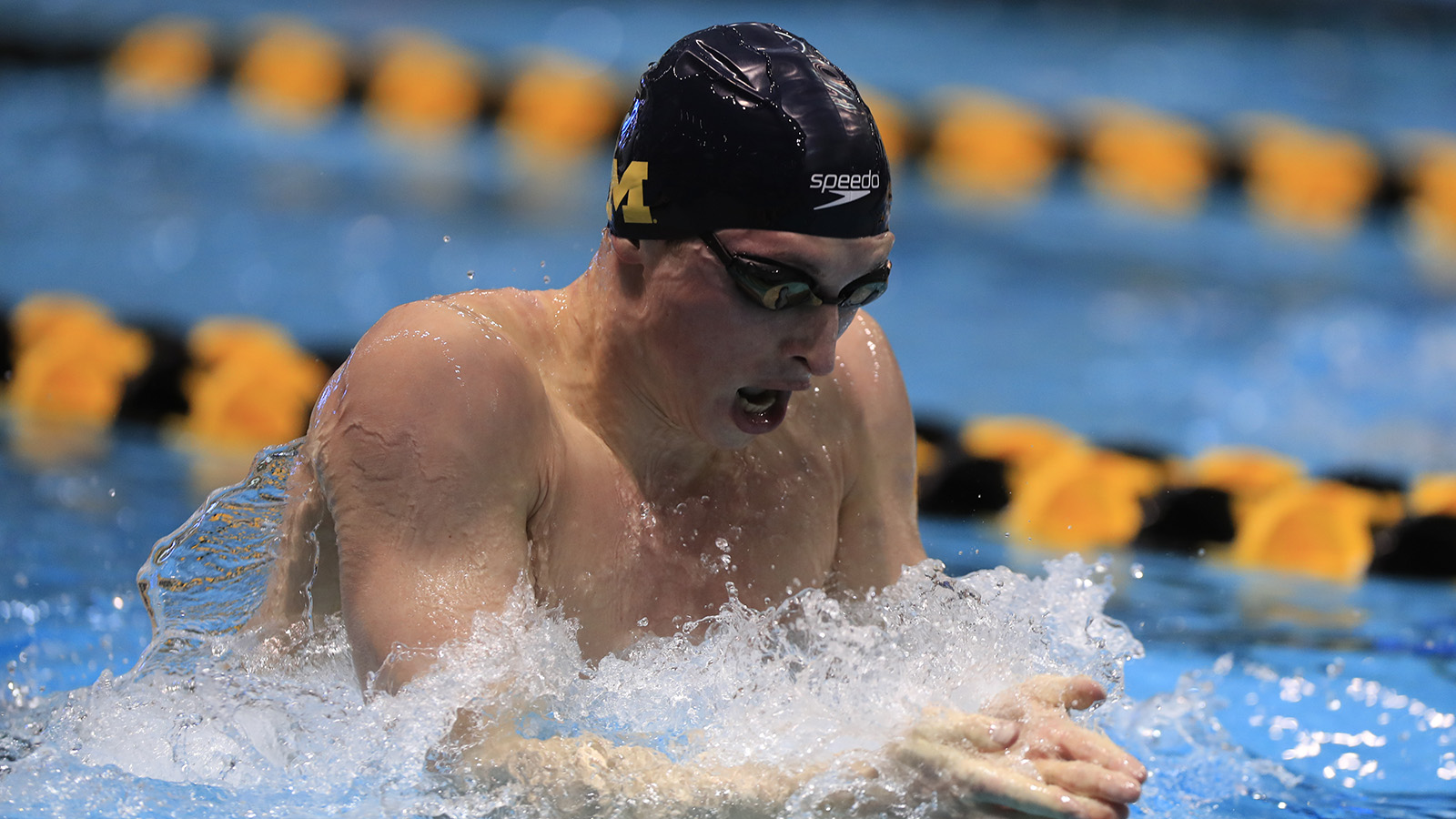 Tommy Cope swimming breastroke for U-M