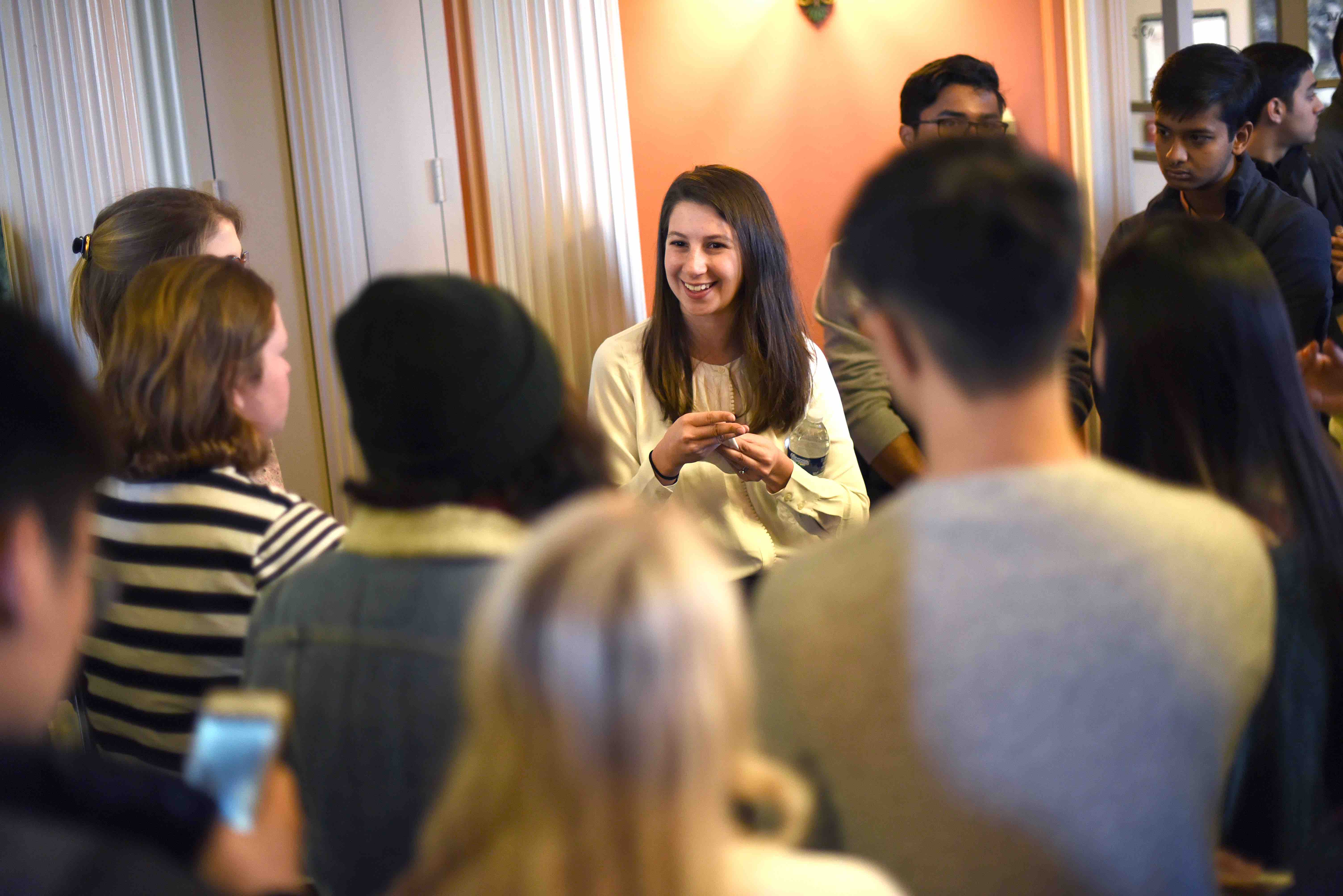 Dr. Katie Bouman chats with a crowd of students