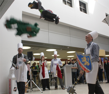 Professors use paper maché dragons to battle
