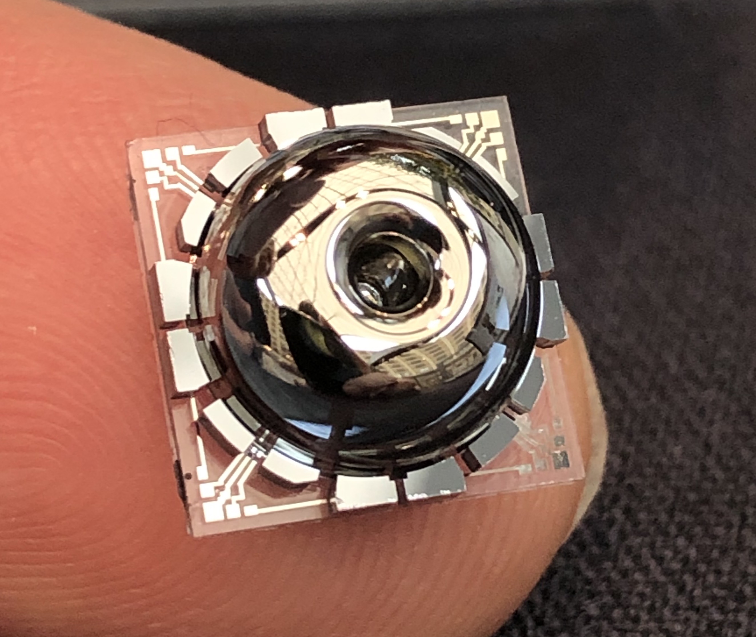 the resonator on a finger tip for scale