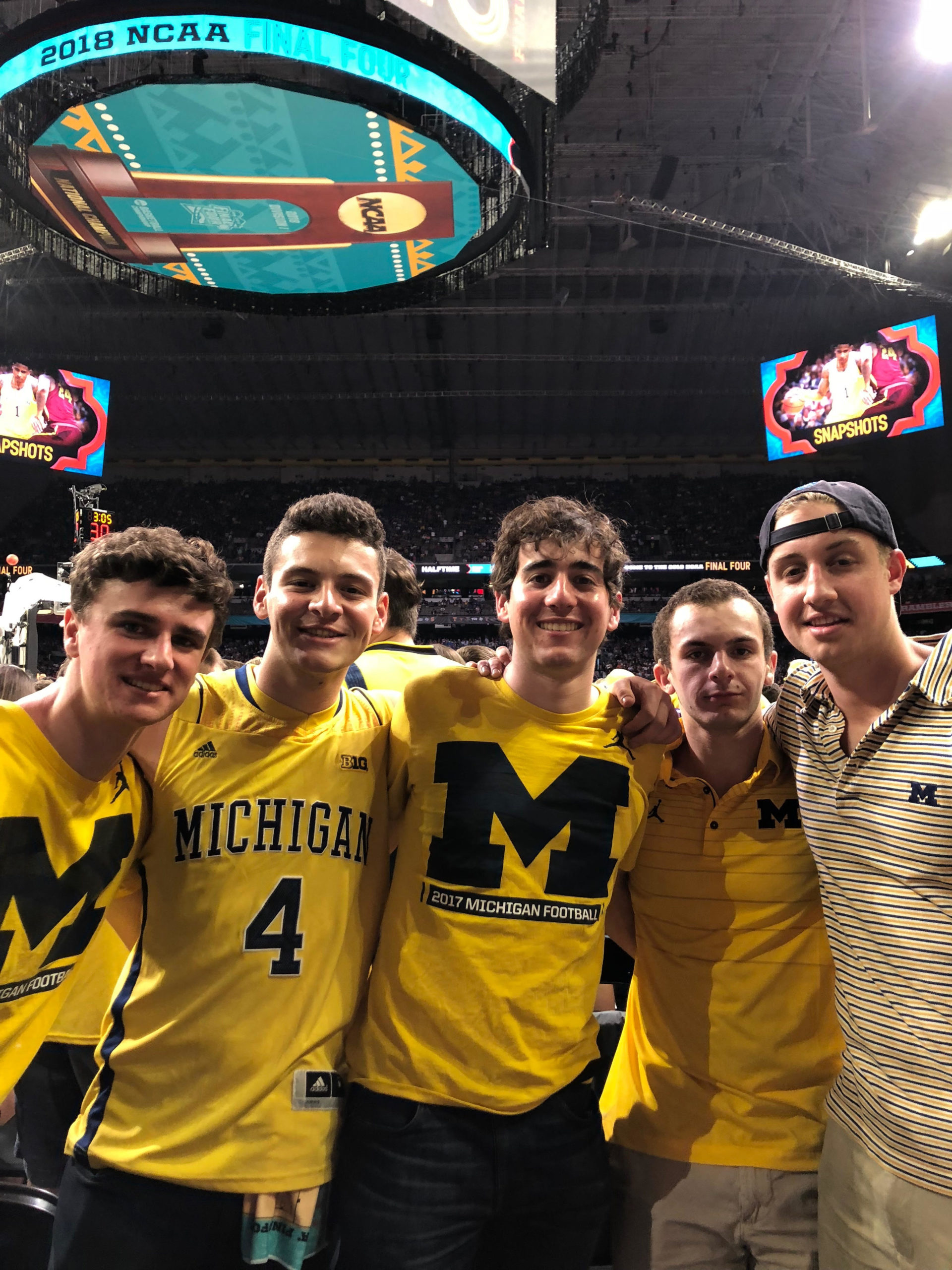 Nicholas and friends at a basketball game