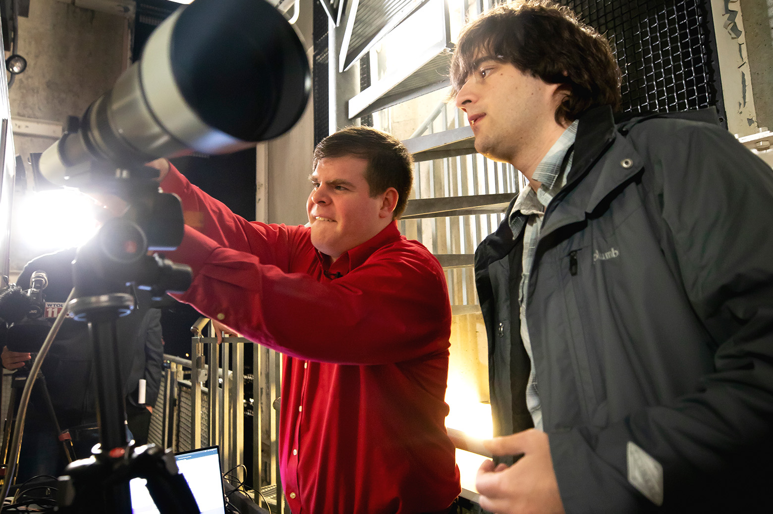 Researchers assembling telescope