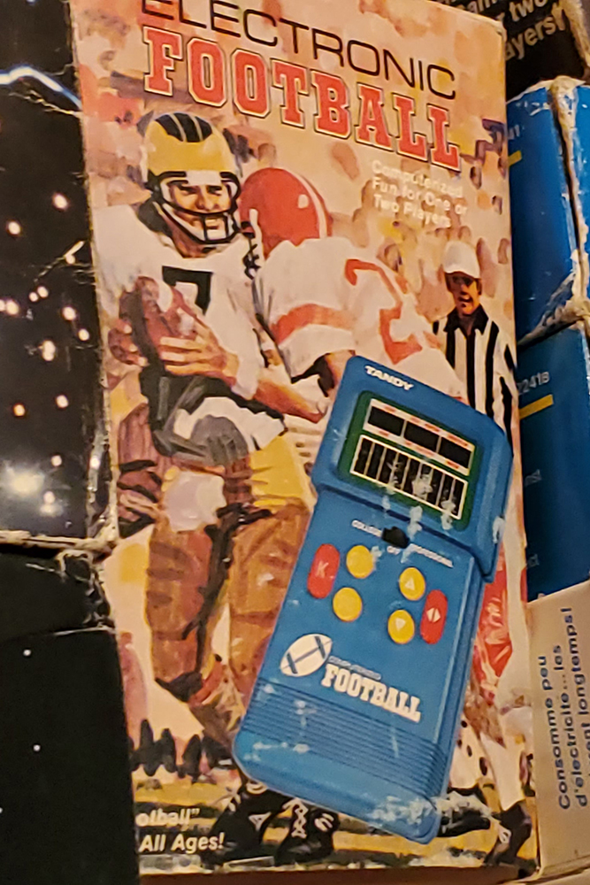Cover of vintage video game featuring Michigan football