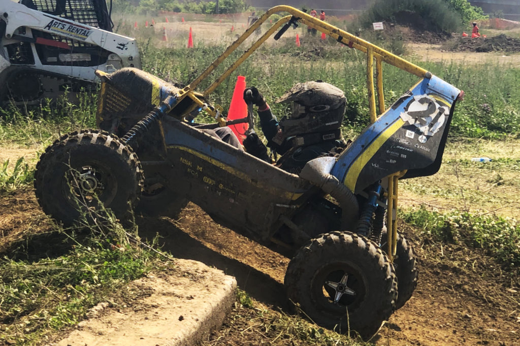 image of Baja car competing in obstacle course