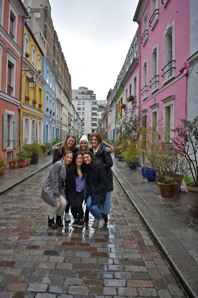 Group of friends in colorful Parisian street