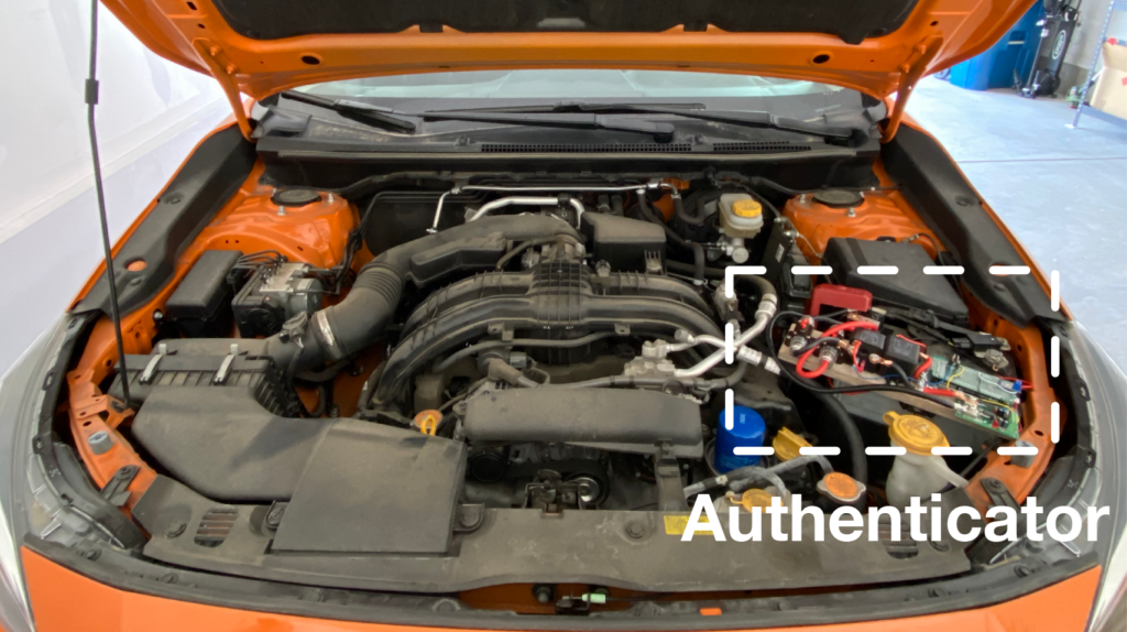Car engine with Battery Sleuth authenticator installed.