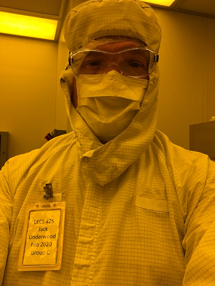 Jack Underwood in a bunny suit in the LNF clean room