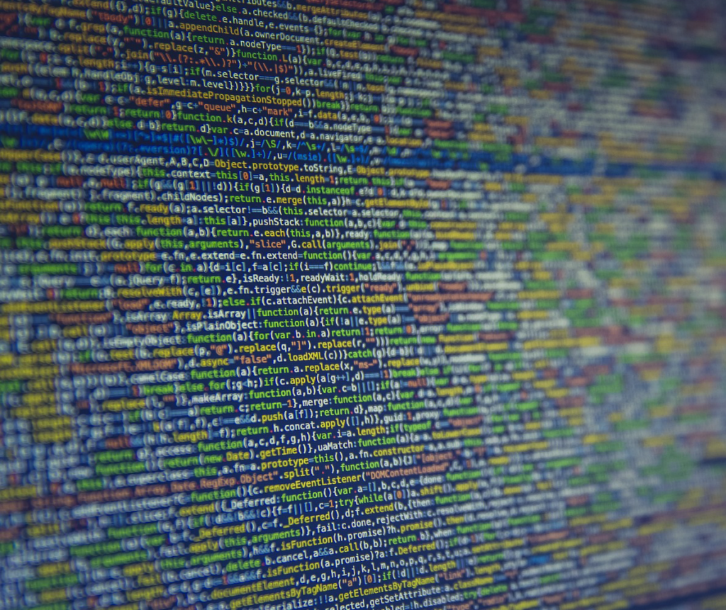 Computer screen with multicolored code