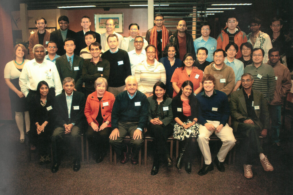 Faculty, staff, and colleagues group shot at Pallab Bhattacharya's symposium.
